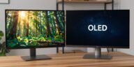 Two monitors side-by-side showing a 4K UHD vs OLED display comparison with nature and space scenes