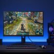 Side-by-side comparison of the best 1440p gaming monitors showcasing OLED, IPS, and Mini LED displays with HDR gaming visuals
