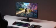 Best gaming monitors under 300 USD AOC Q27G40XMN on a gaming desk