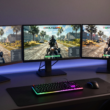 Best Monitors for Warzone gaming setup with three displays showing competitive gameplay