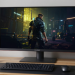 Best TVs for PC monitors showing a 42-inch LG C5 OLED used for gaming on a desk setup