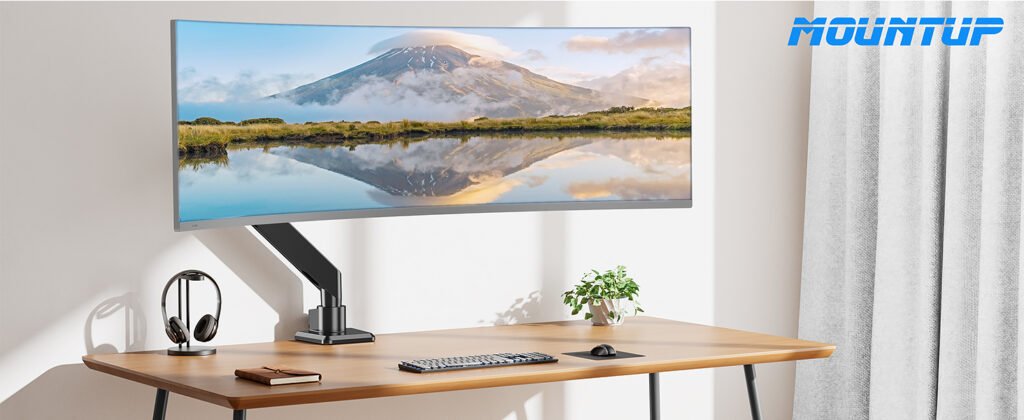 Samsung Odyssey G4 monitor arm in a tidy London home office